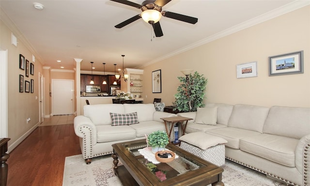 2203 Dorrington St Unit 208, Houston, TX 77030 - living area with ornamental molding, baseboards, wood finished floors, ceiling fan, and recessed lighting