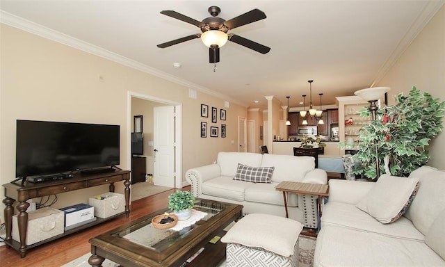 2203 Dorrington St Unit 208, Houston, TX 77030 - living room with a ceiling fan, crown molding, wood finished floors, and a chandelier
