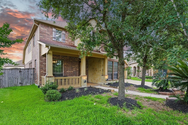 19014 Ridge Cove Ln, Cypress, TX 77433 - obstructed view of property with covered porch and brick siding