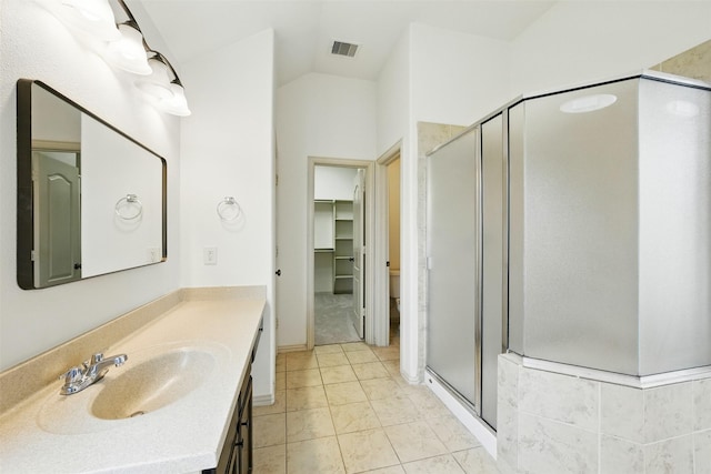 19014 Ridge Cove Ln, Cypress, TX 77433 - full bath featuring vanity, a stall shower, lofted ceiling, and a spacious closet