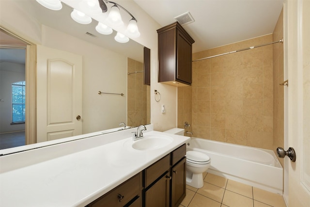 19014 Ridge Cove Ln, Cypress, TX 77433 - bathroom with tile patterned flooring, toilet, vanity, and shower / bathtub combination