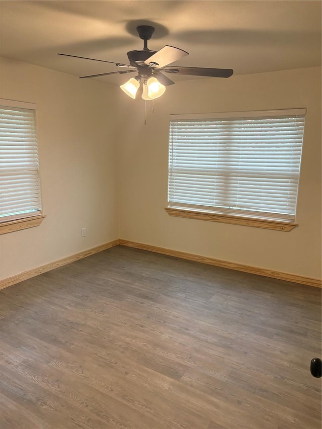1845 Shepherd St, Hempstead, TX 77445 - spare room featuring a ceiling fan, wood finished floors, and baseboards