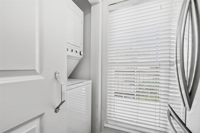 18809 Egret Bay Blvd Unit 114, Webster, TX 77058 - washroom with stacked washing machine and dryer