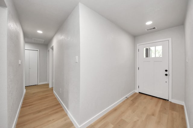 4439 Kacee Dr, Houston, TX 77084 - foyer with light wood-style flooring and recessed lighting