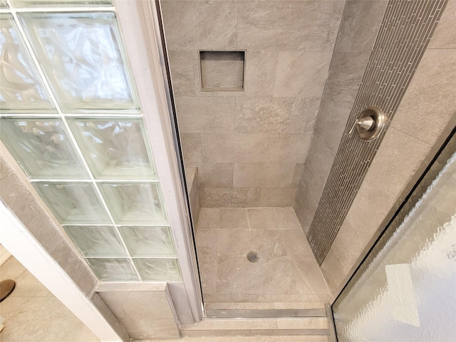 5703 Fraser Ave, Galveston, TX 77551 - full bathroom with tiled shower