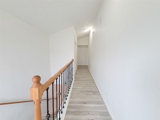 5703 Fraser Ave, Galveston, TX 77551 - hall with light wood-style floors and baseboards