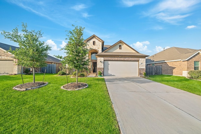 5107 Twin Summit Dr, Rosenberg, TX 77469 - view of front of home featuring brick siding, driveway, and a garage