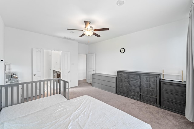 5107 Twin Summit Dr, Rosenberg, TX 77469 - carpeted bedroom with ceiling fan