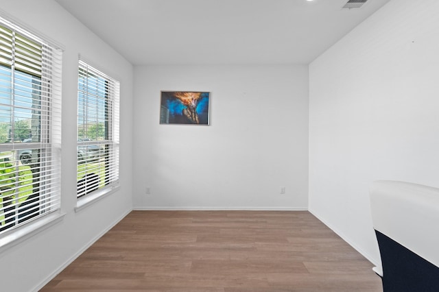 5107 Twin Summit Dr, Rosenberg, TX 77469 - spare room featuring wood finished floors and baseboards