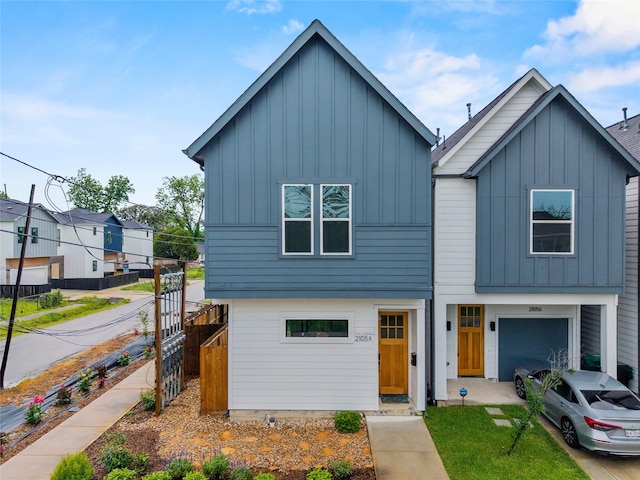2105 Sam Wilson St Unit A, Houston, TX 77020 - modern farmhouse featuring board and batten siding and a garage