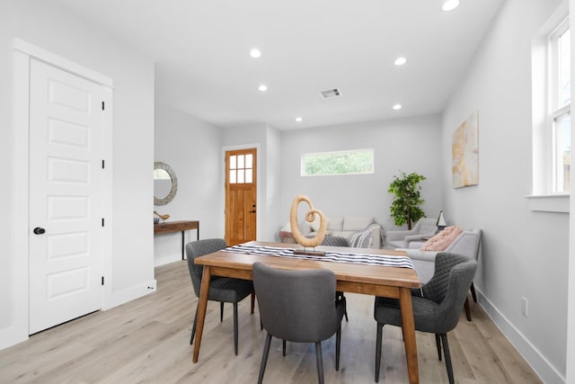 2105 Sam Wilson St Unit A, Houston, TX 77020 - dining room with light wood-style floors, recessed lighting, and baseboards