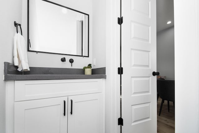 2105 Sam Wilson St Unit A, Houston, TX 77020 - bathroom with vanity, wood finished floors, and recessed lighting