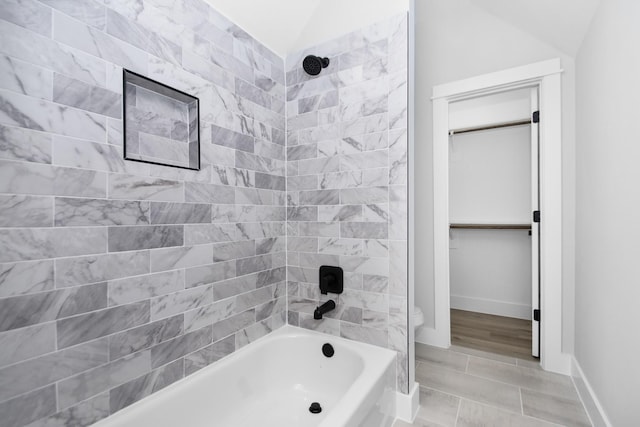 2105 Sam Wilson St Unit A, Houston, TX 77020 - full bath with toilet, shower / tub combination, lofted ceiling, and baseboards