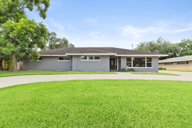 3619 N Braeswood Blvd, Houston, TX 77025 - ranch-style home with a front lawn, brick siding, and concrete driveway
