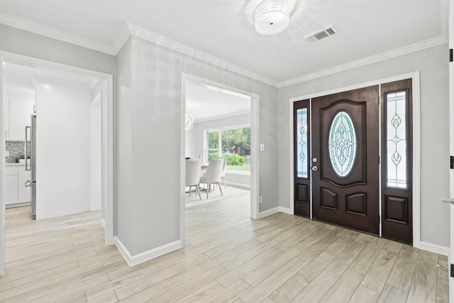3619 N Braeswood Blvd, Houston, TX 77025 - foyer featuring light wood-style floors and ornamental molding