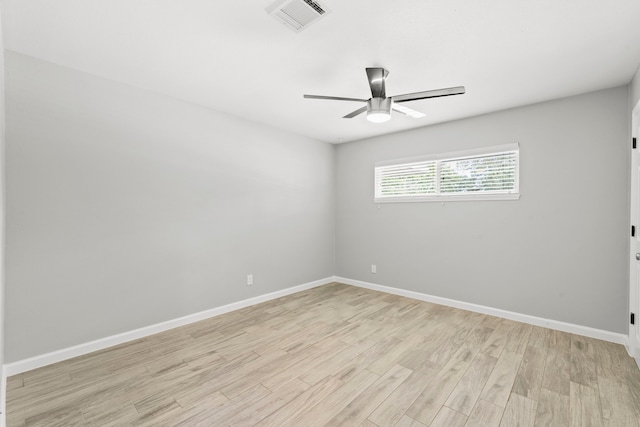 3619 N Braeswood Blvd, Houston, TX 77025 - spare room with a ceiling fan and light wood-type flooring
