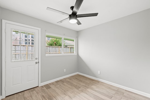 3619 N Braeswood Blvd, Houston, TX 77025 - entryway with light wood-style floors and ceiling fan