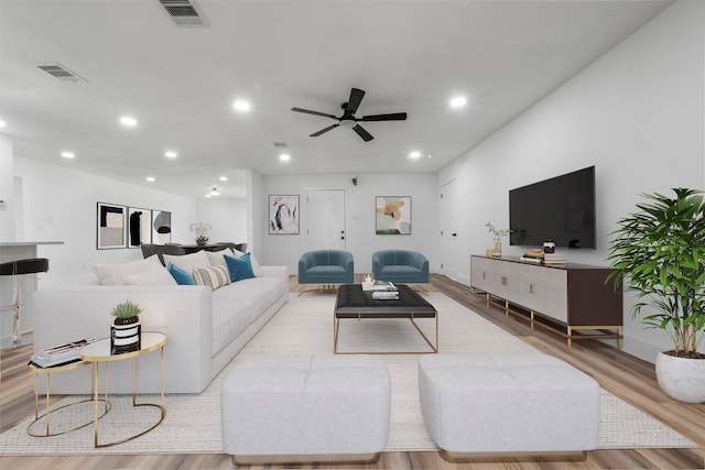 6155 Ridgeway Dr, Houston, TX 77033 - living area with wood finished floors, recessed lighting, and ceiling fan