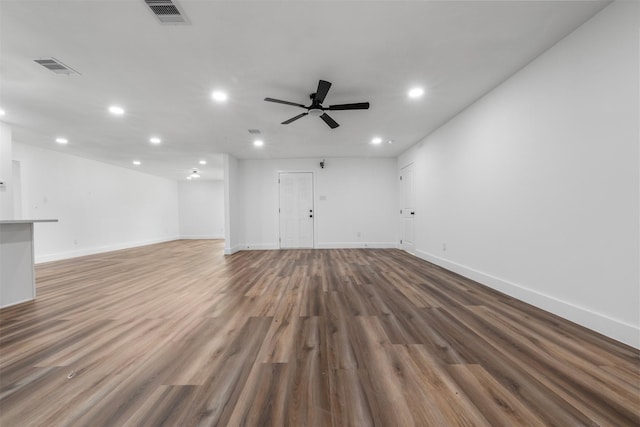 6155 Ridgeway Dr, Houston, TX 77033 - unfurnished living room featuring recessed lighting, wood finished floors, and ceiling fan