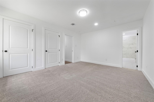 6155 Ridgeway Dr, Houston, TX 77033 - unfurnished bedroom with carpet flooring and ensuite bathroom