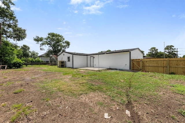 6155 Ridgeway Dr, Houston, TX 77033 - rear view of house featuring a patio area and a gate