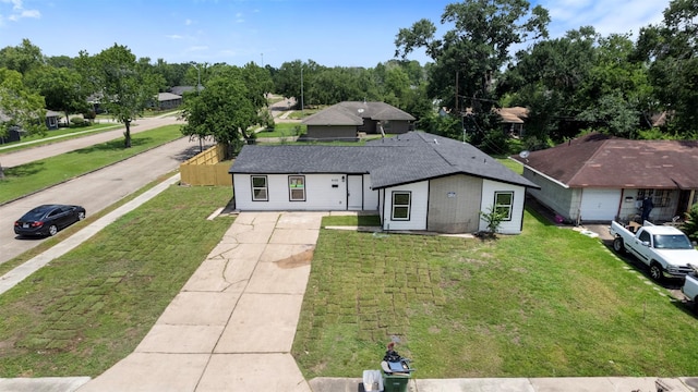 6155 Ridgeway Dr, Houston, TX 77033 - view of front of home with driveway, brick siding, and a shingled roof