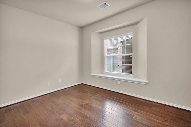 25402 Lancaster Pine Dr, Spring, TX 77389 - empty room featuring baseboards and dark wood-type flooring