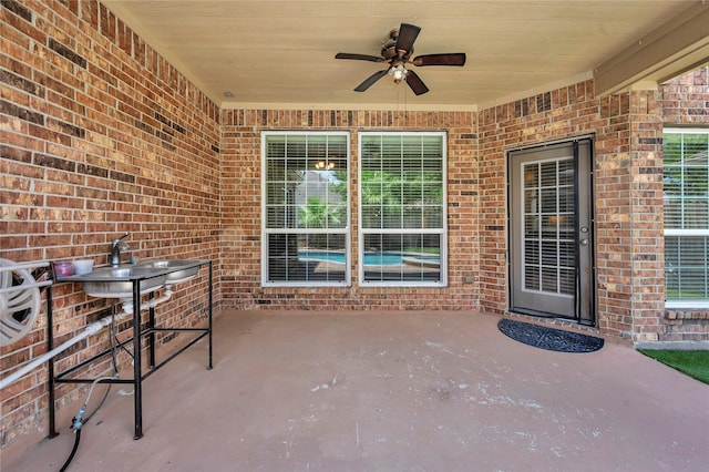 25402 Lancaster Pine Dr, Spring, TX 77389 - view of patio with ceiling fan and a sink