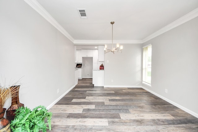 15723 Cascade Point Dr, Houston, TX 77084 - unfurnished dining area with a chandelier, ornamental molding, dark wood-style floors, and baseboards