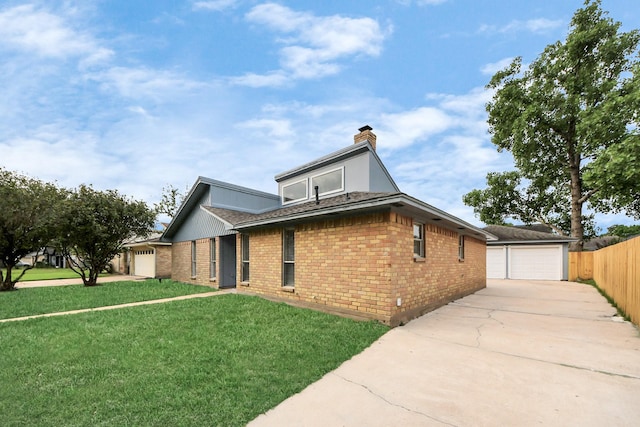 15723 Cascade Point Dr, Houston, TX 77084 - view of side of property with brick siding, a chimney, an attached garage, and driveway