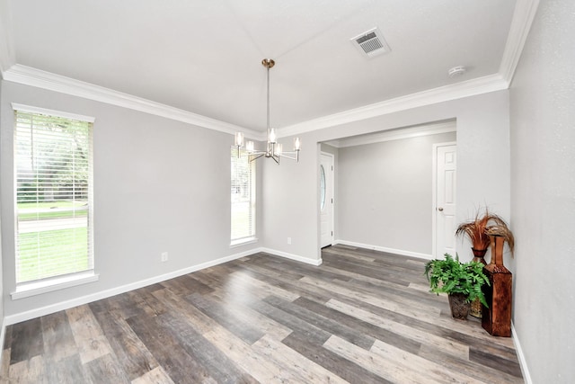15723 Cascade Point Dr, Houston, TX 77084 - empty room with a chandelier, crown molding, dark wood-type flooring, and baseboards