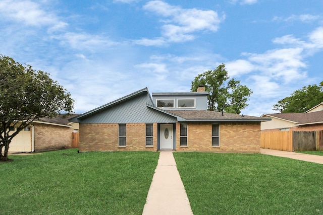 15723 Cascade Point Dr, Houston, TX 77084 - mid-century home with brick siding, a chimney, and roof with shingles