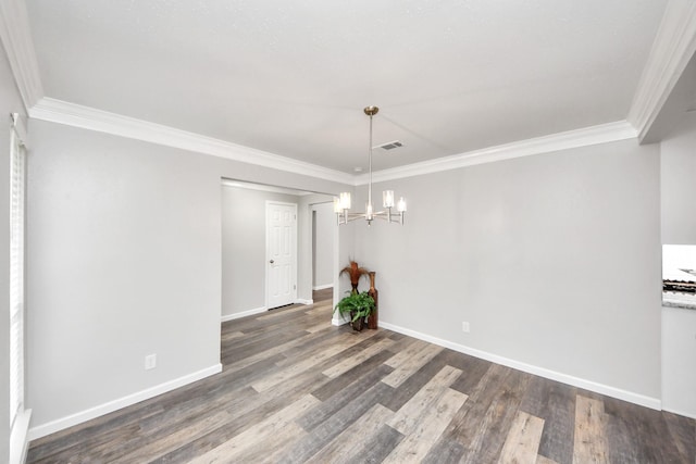 15723 Cascade Point Dr, Houston, TX 77084 - unfurnished dining area featuring a chandelier, ornamental molding, wood finished floors, and baseboards