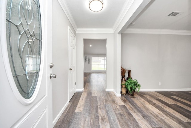 15723 Cascade Point Dr, Houston, TX 77084 - entrance foyer with dark wood-type flooring, ornamental molding, and baseboards