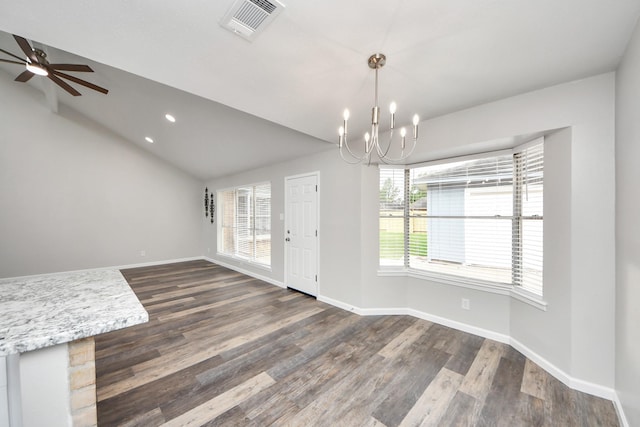 15723 Cascade Point Dr, Houston, TX 77084 - unfurnished dining area featuring a chandelier, dark wood-type flooring, baseboards, lofted ceiling, and ceiling fan