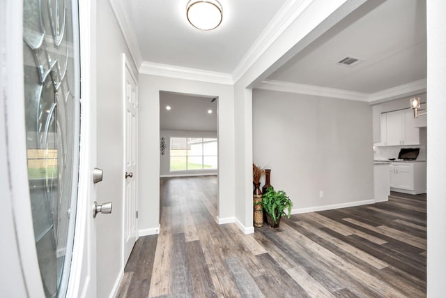 15723 Cascade Point Dr, Houston, TX 77084 - foyer featuring dark wood-style flooring, crown molding, and baseboards