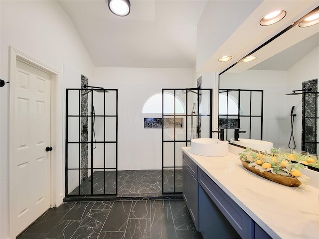 218 Windrift Ct, Sugar Land, TX 77479 - full bath featuring lofted ceiling, a walk in shower, marble finish flooring, recessed lighting, and vanity