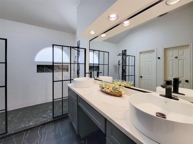 218 Windrift Ct, Sugar Land, TX 77479 - full bathroom featuring recessed lighting, walk in shower, marble finish flooring, lofted ceiling, and double vanity