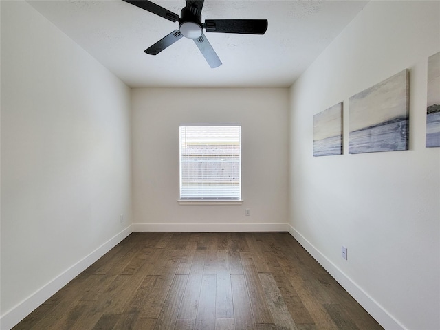 218 Windrift Ct, Sugar Land, TX 77479 - spare room with dark wood-style floors, baseboards, and a ceiling fan