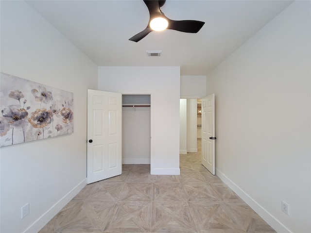 218 Windrift Ct, Sugar Land, TX 77479 - unfurnished bedroom featuring baseboards, a closet, and a ceiling fan