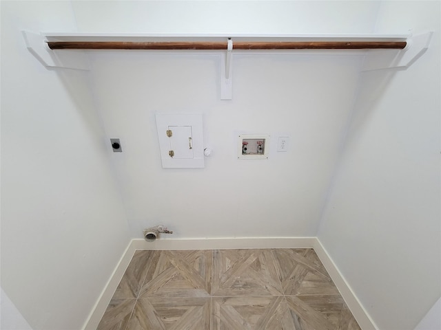 218 Windrift Ct, Sugar Land, TX 77479 - laundry area with hookup for a gas dryer, electric dryer hookup, baseboards, and washer hookup