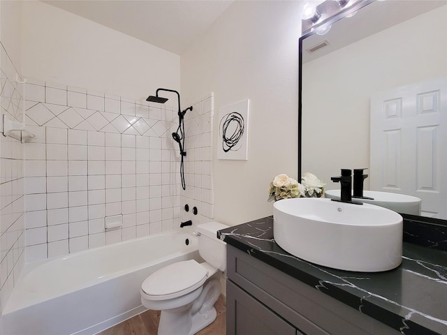 218 Windrift Ct, Sugar Land, TX 77479 - bathroom with shower / washtub combination, vanity, toilet, and wood finished floors