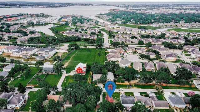434 Lakeside Dr, Kemah, TX 77565 - aerial overview of property's location with a large body of water and nearby suburban area