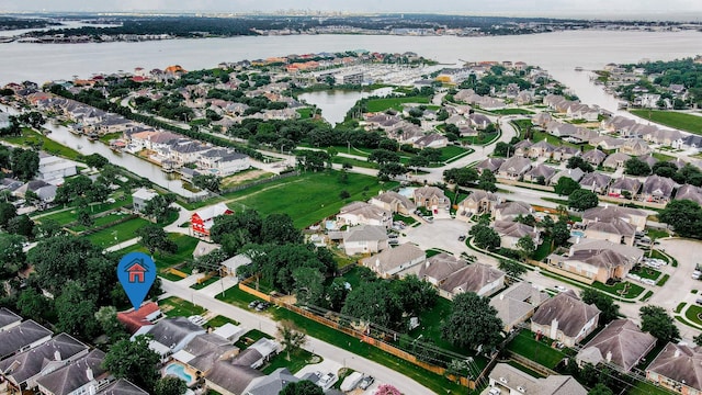 434 Lakeside Dr, Kemah, TX 77565 - aerial view of property's location with a nearby body of water and nearby suburban area