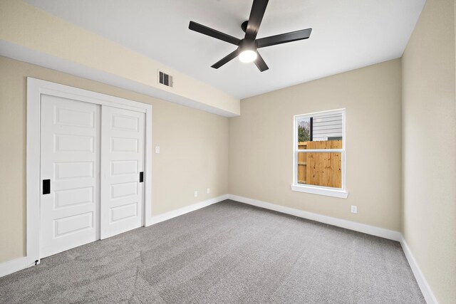 3107 Grassmere St A/B, Unit A/B Houston, TX 77051 - unfurnished bedroom featuring carpet, baseboards, a closet, and a ceiling fan