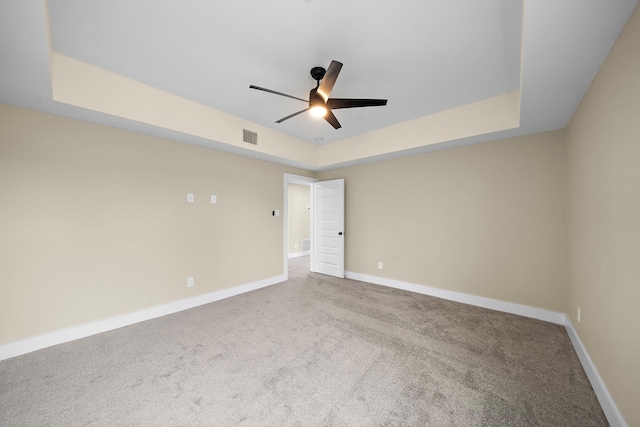 3107 Grassmere St A/B, Unit A/B Houston, TX 77051 - unfurnished room with a tray ceiling, carpet flooring, baseboards, and a ceiling fan