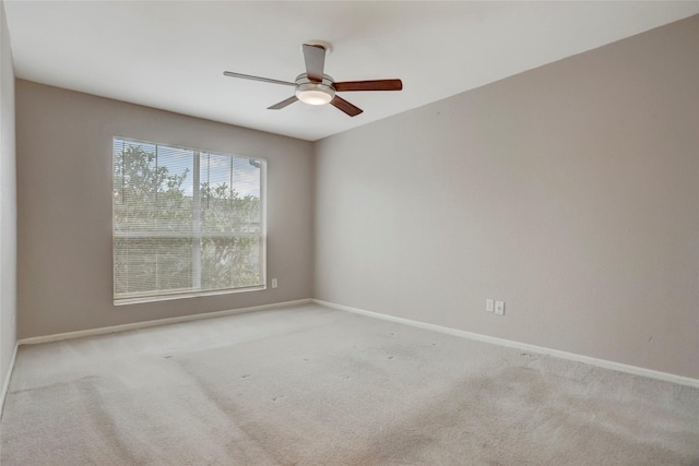 1500 Bay Area Blvd Unit 433, Houston, TX 77058 - spare room featuring carpet floors, a ceiling fan, and baseboards