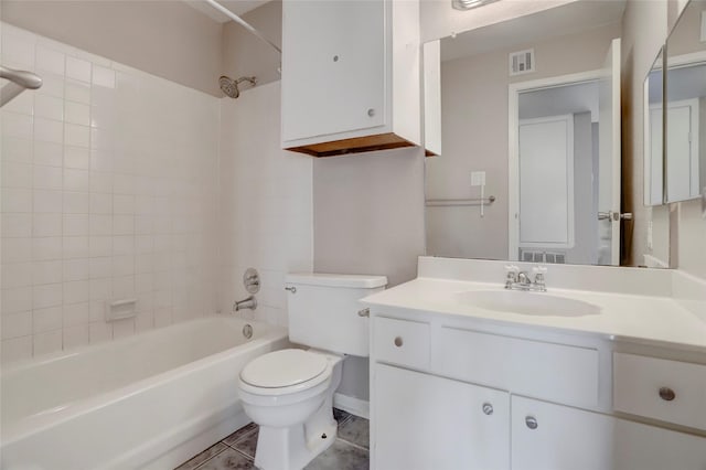 1500 Bay Area Blvd Unit 433, Houston, TX 77058 - full bathroom featuring toilet, vanity,  shower combination, and tile patterned floors