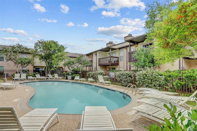 1500 Bay Area Blvd Unit 433, Houston, TX 77058 - community pool featuring a patio