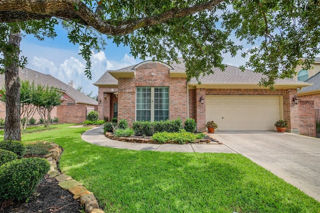1211 Brinson Ct, Spring, TX 77379 - traditional home featuring brick siding, a garage, a front lawn, driveway, and a shingled roof